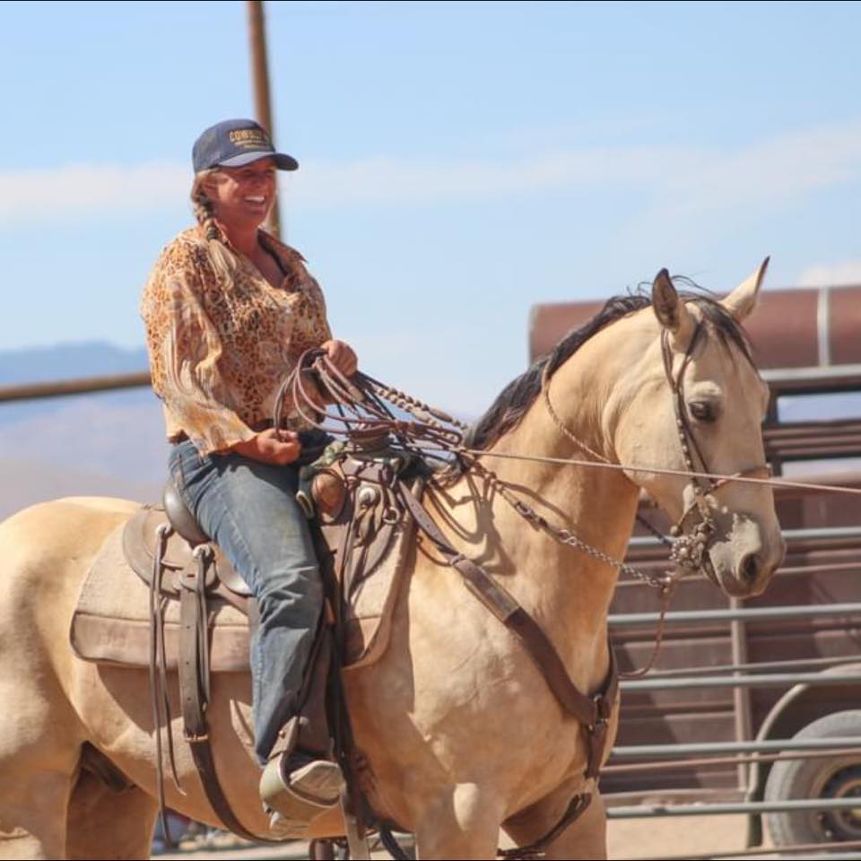 Amanda Wentz on palomino horse
